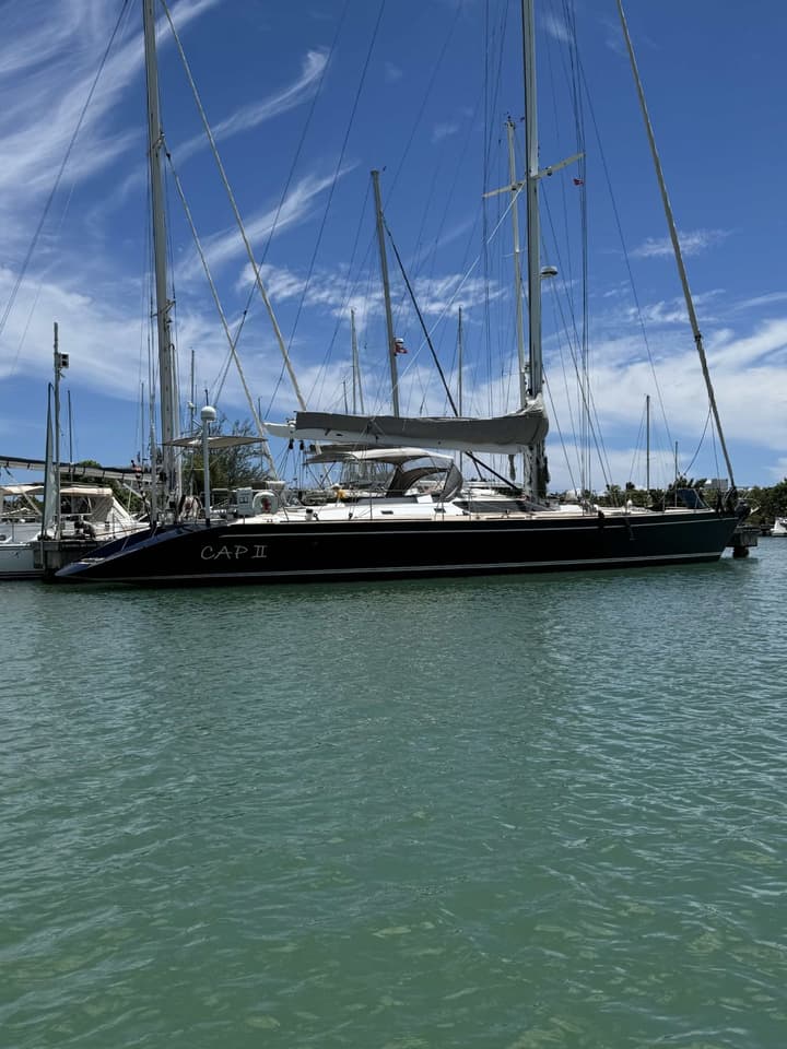Cap II moored at a marina, name visible on the hull.
